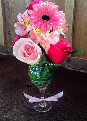 Wine glass flower arrangement