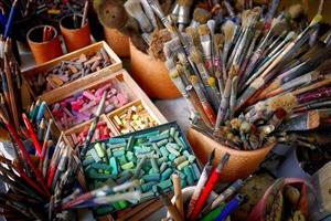 Assortment of well-used art supplies.
